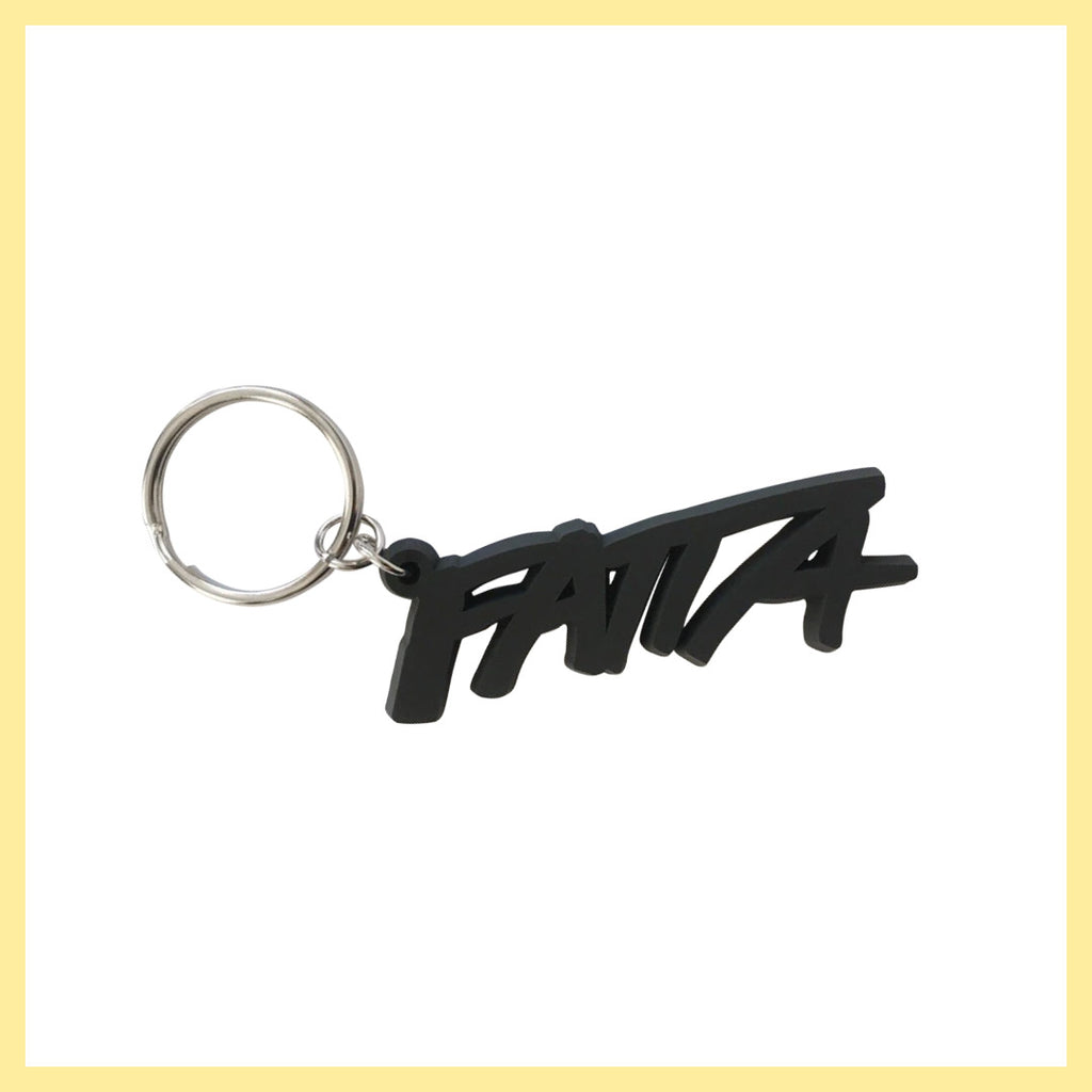 Fem stycken nyckelringar med Fatta-loggan i mjuk svart plast.
